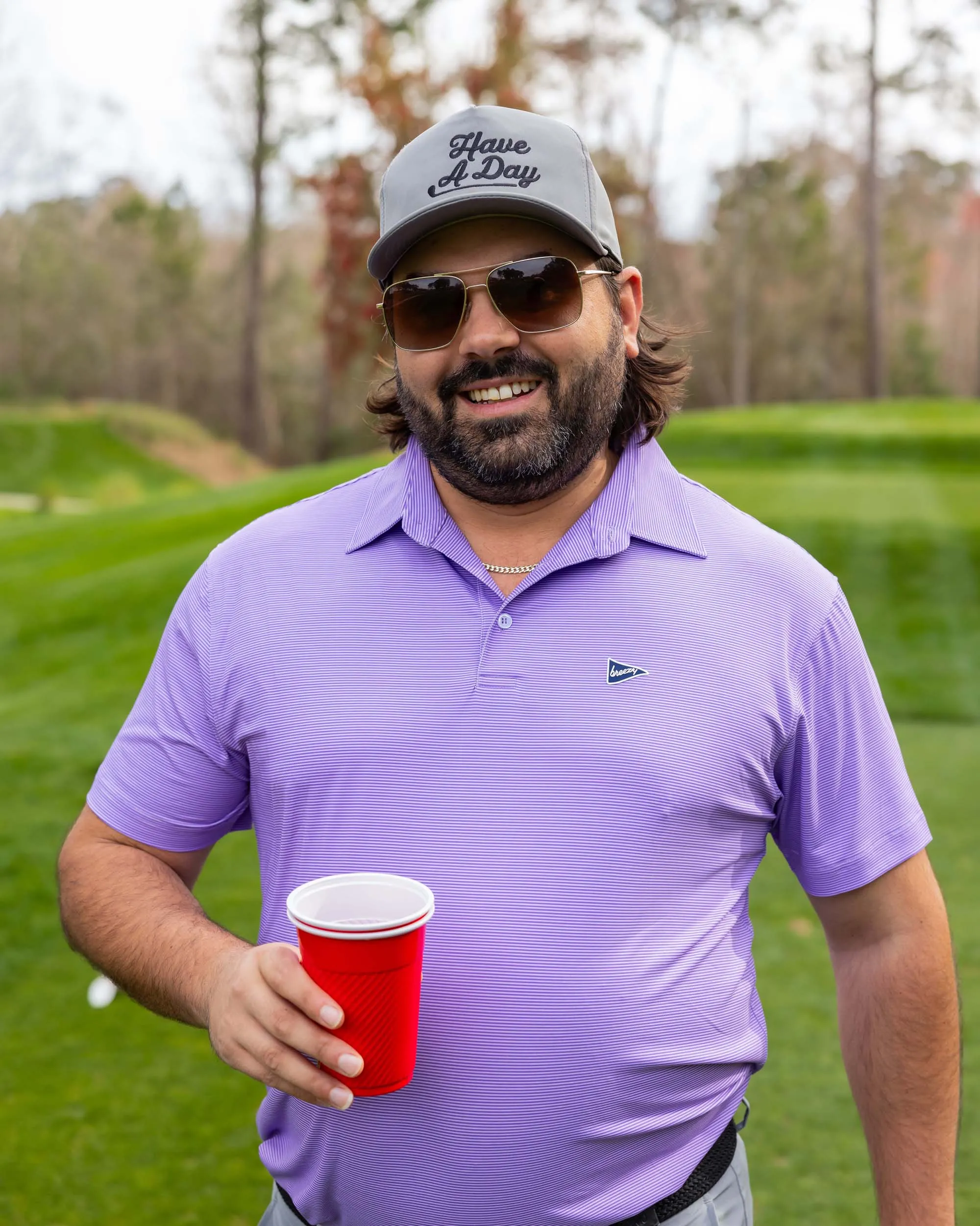 Breezy Golf The Purple Stripe Polo Shirt in Dark Purple Lavender