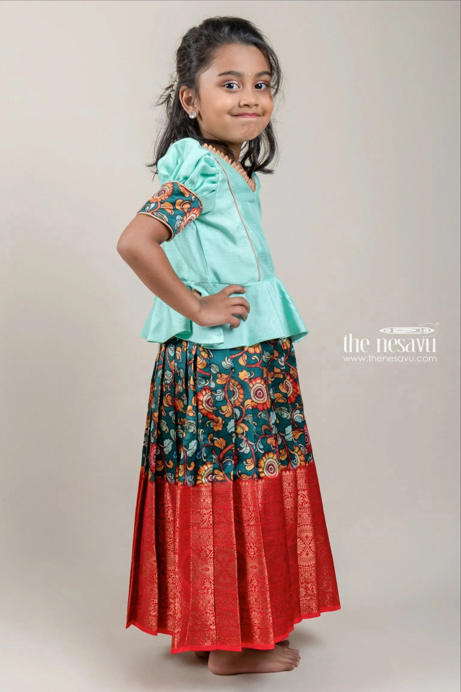 Green Silk Pattu Pavadai with Floral Cuffs and Banarasi Border for Girls