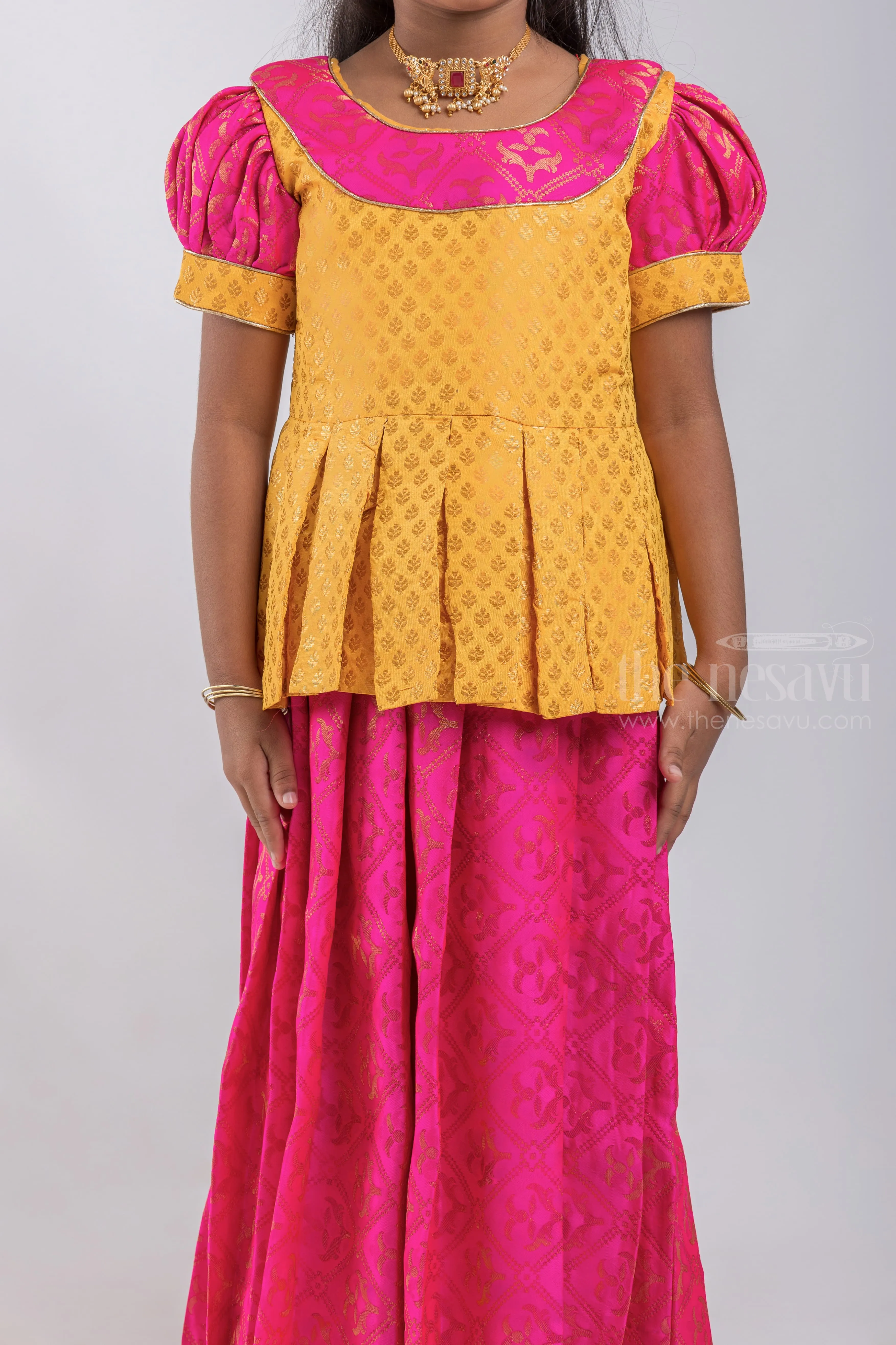 Premium Yellow Brocade Designer Pleated Blouse And Pink Floral Designer Silk Skirt For Girls