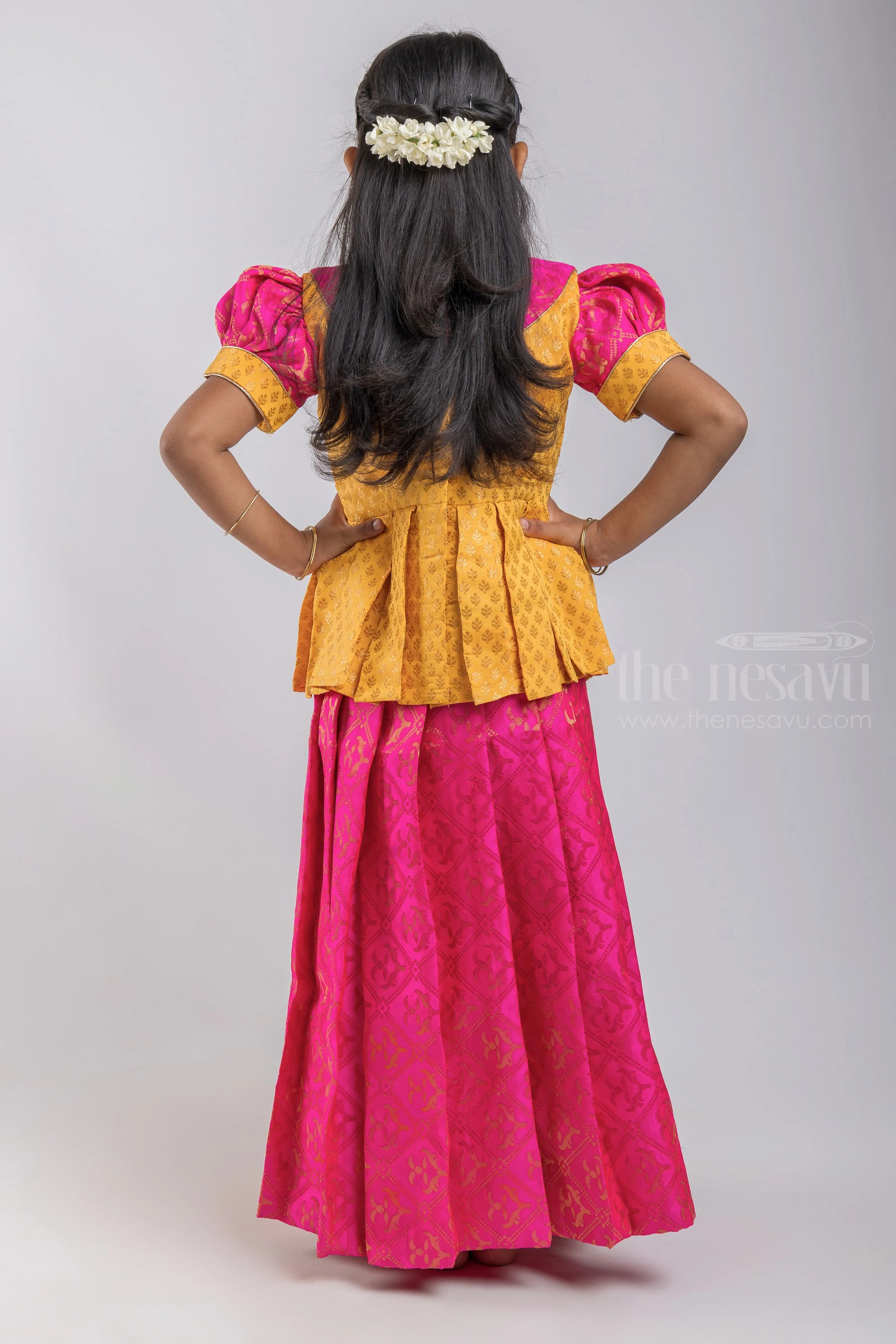 Premium Yellow Brocade Designer Pleated Blouse And Pink Floral Designer Silk Skirt For Girls