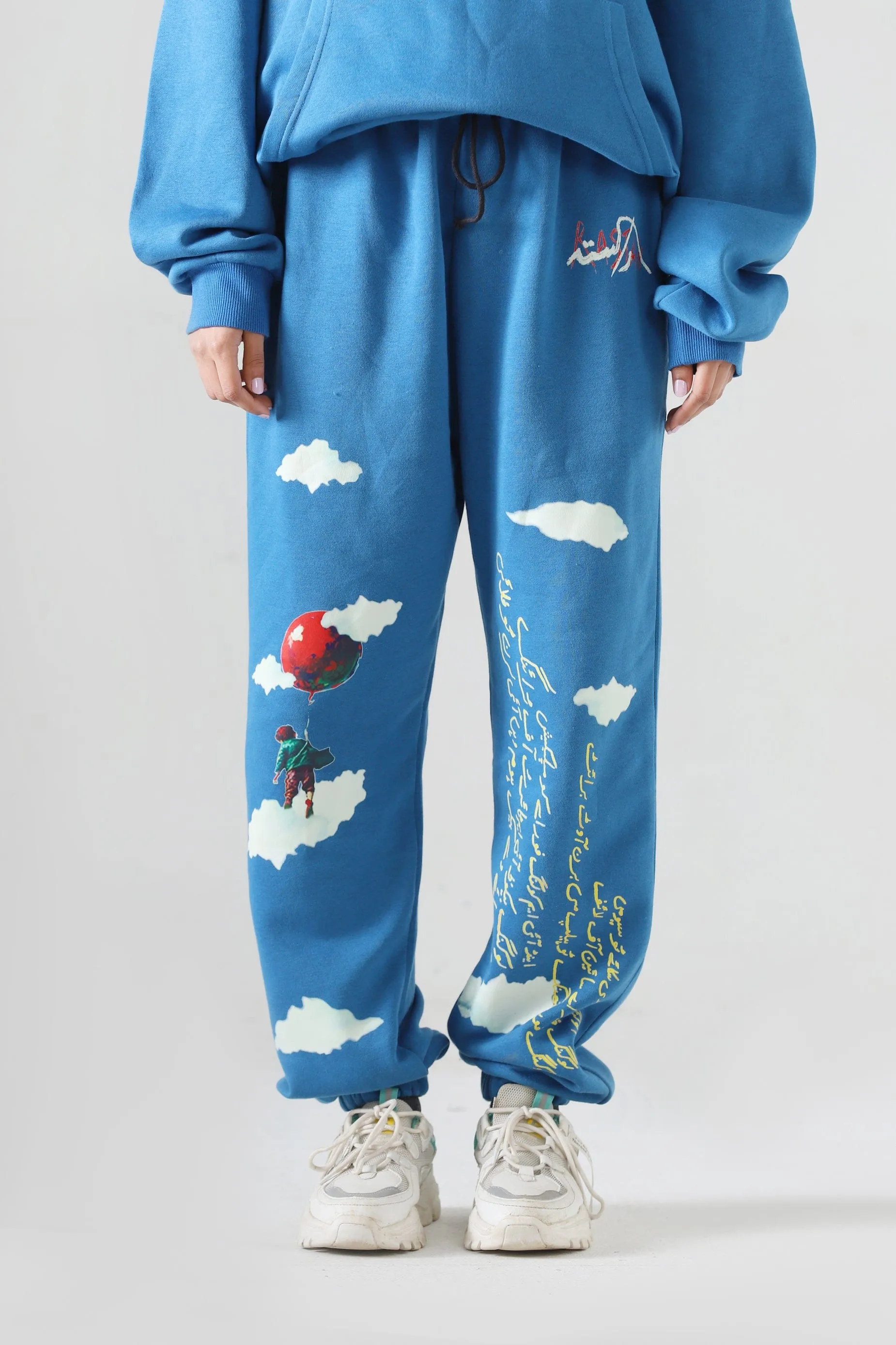 "LEARNING TO FLY" SKY BLUE SWEATPANTS