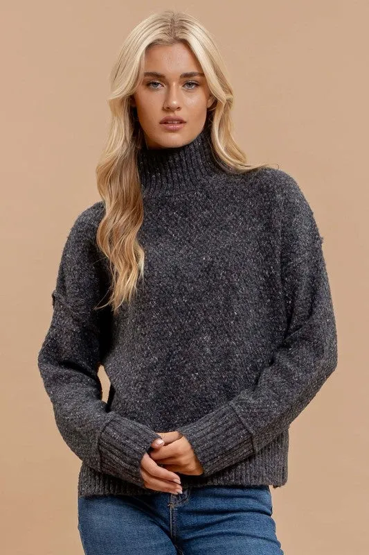 ZENDAYA WOOL BLEND TURTLENECK LONG SLEEVE SWEATER